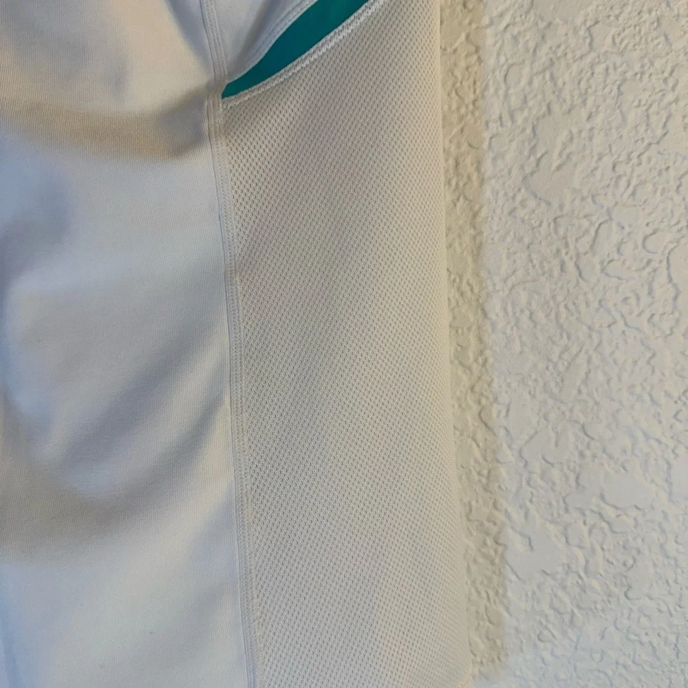 Nike Dri-FIT V-neck short-sleeve athletic top‎ white with teal. Size M